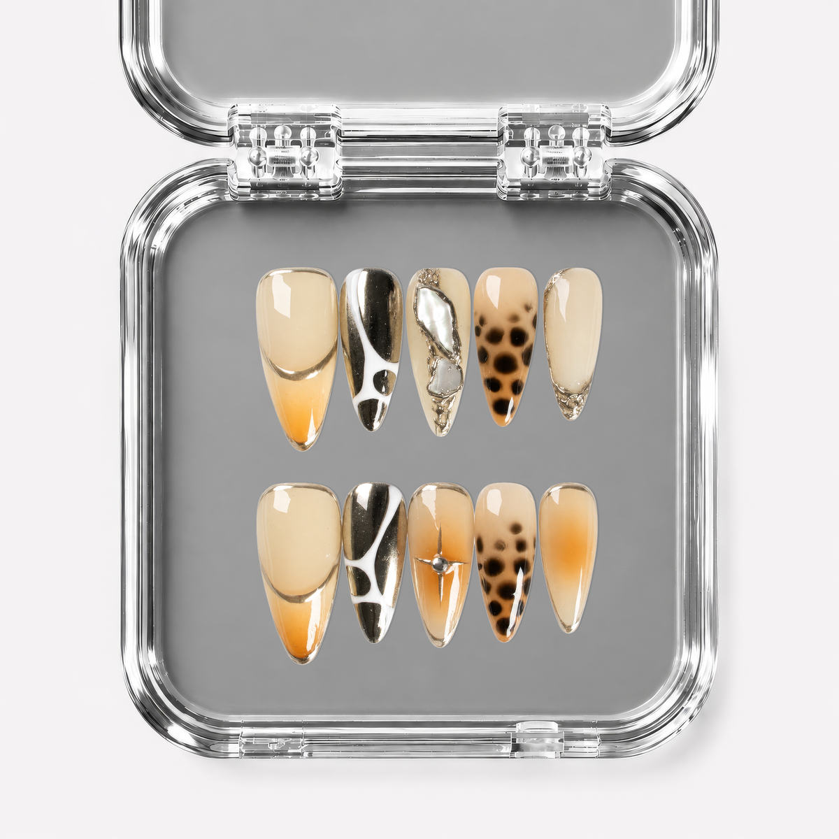 SUNDAY SAFARI, stiletto press-on nails, medium length, animal print, chrome, fade, view 1